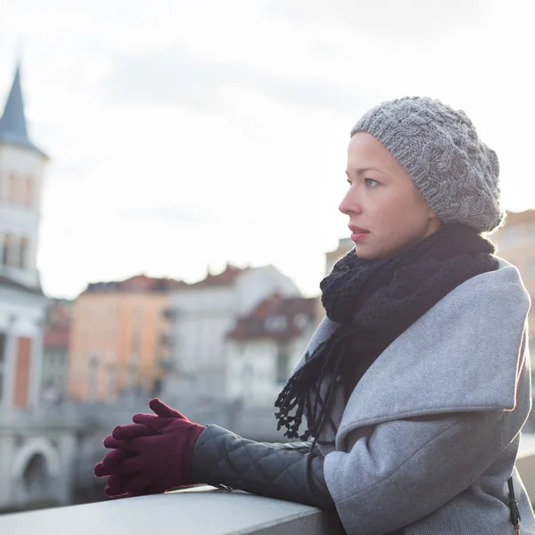 Thoughtful woman outdoors on cold winter day. — Stock Photo, Image