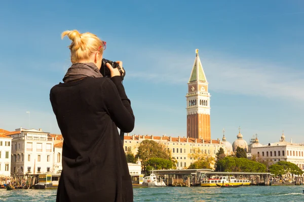 Female tourist taking photo of Venice. — Stockfoto