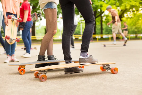 Teenage girl practicing riding long board. — Stock Photo, Image