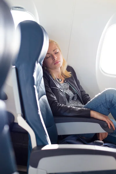 Lady traveling napping on a plain. — Stock Photo, Image