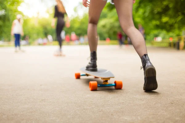 Teenage girl urban long board riding. — Stock Photo, Image