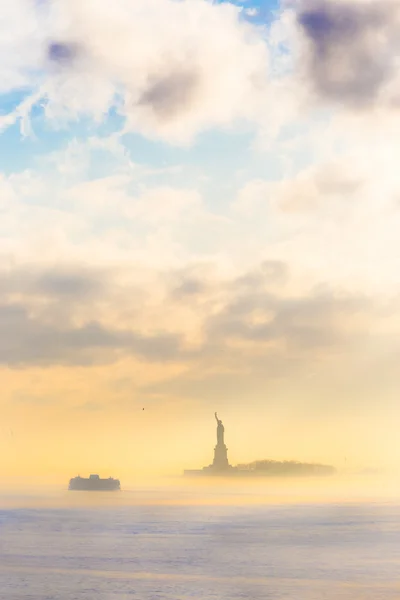Staten Island Ferry cruises past the Statue of Liberty. — Stok fotoğraf