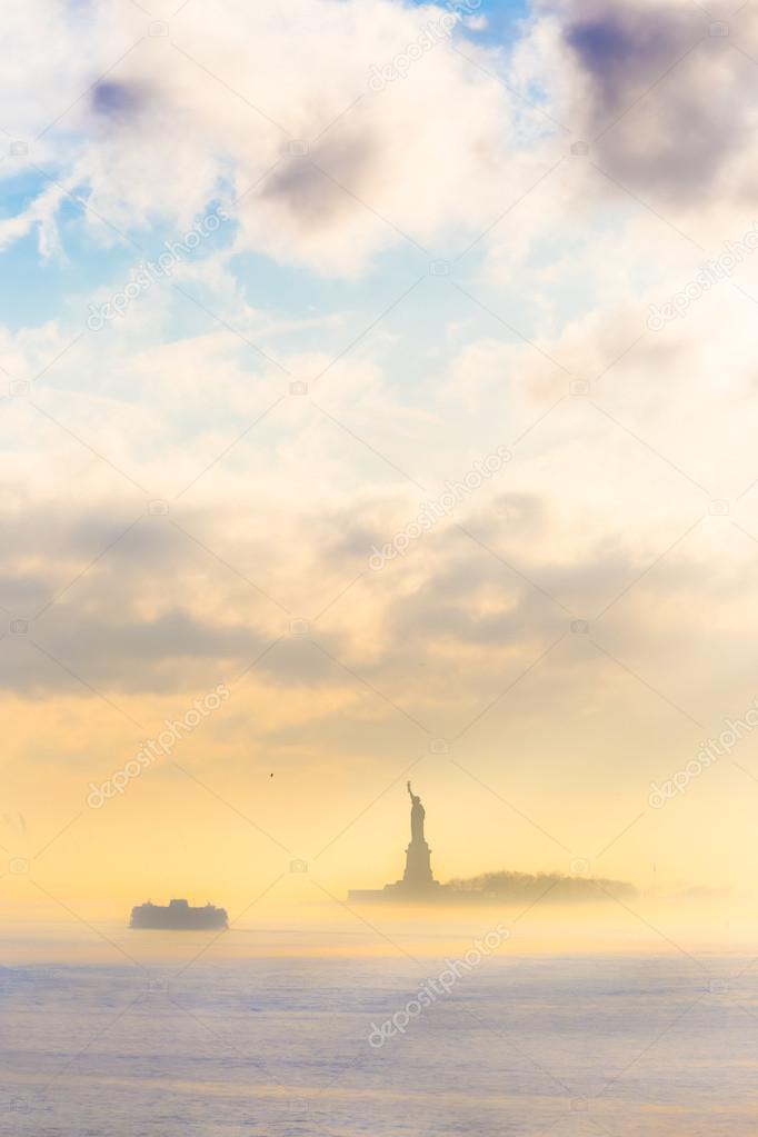 Staten Island Ferry cruises past the Statue of Liberty.