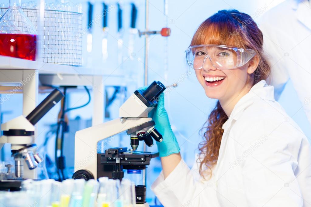 Young scientist having fun in lab.