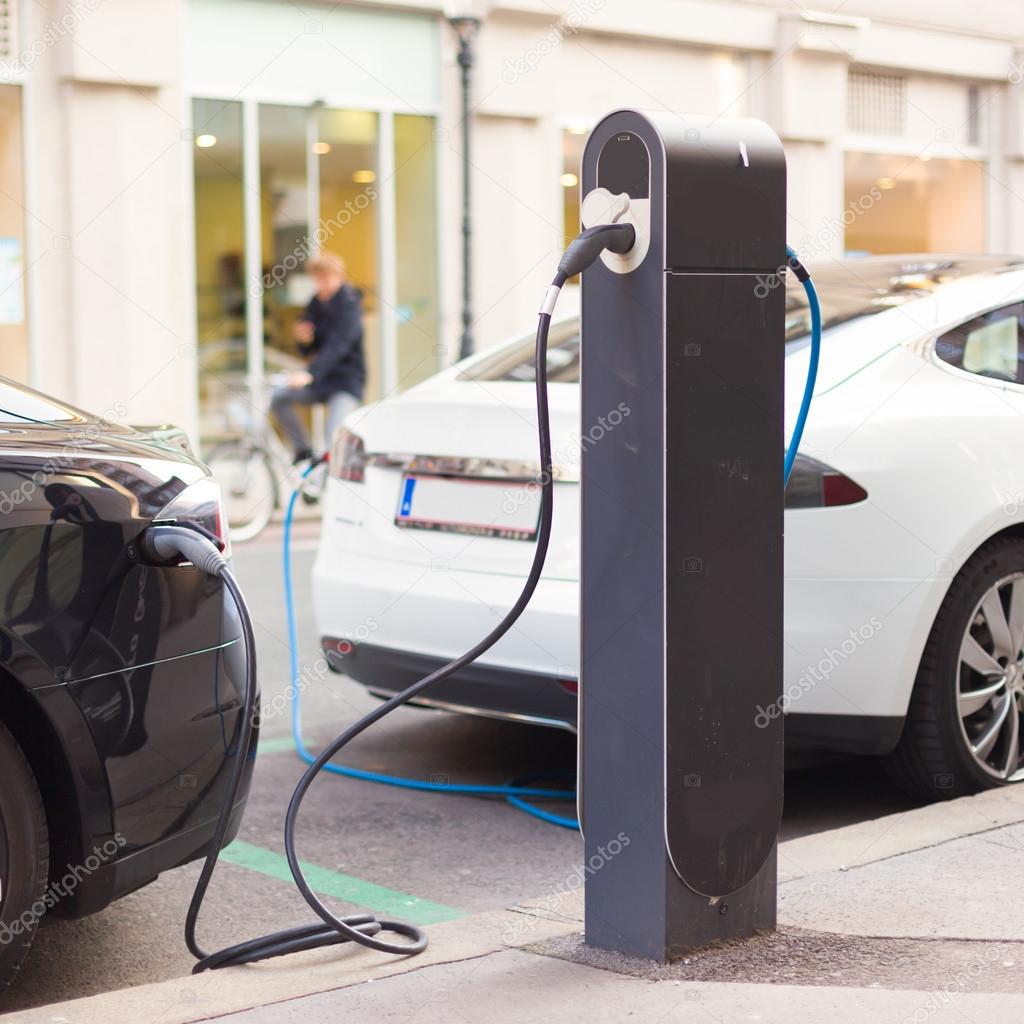 Electric Cars in Charging Station.