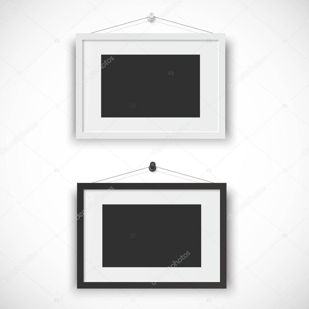 Blank picture frame set hanging on wall