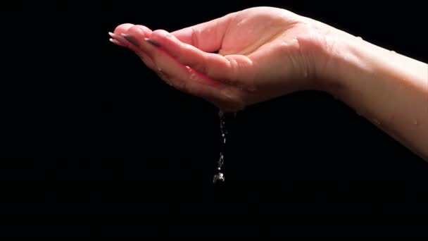 Water Pours Hand Slow Motion Footage Black Background Shoot Red — Stock Video
