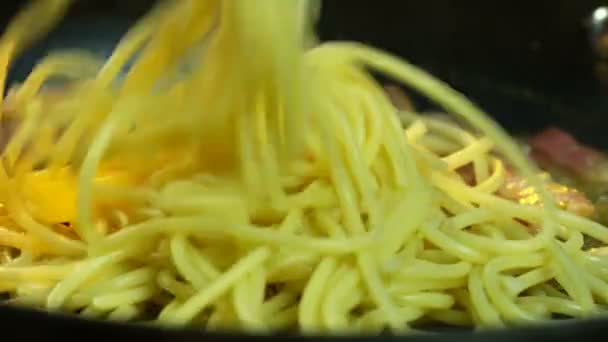 Chef Adds Spaghetti Into Frying Pan — Stock Video