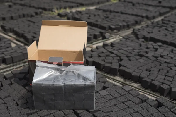 Box of  coconut shell charcoal for shisha — Stock Photo, Image