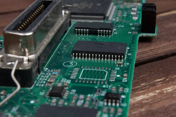 Printed circuit board PCB , a surface-mount technology SMT that connects microchips to the motherboard