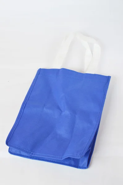 Beyaz arkaplanda bez çanta — Stok fotoğraf