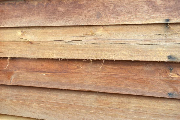 Padrão na nova parede de madeira marrom — Fotografia de Stock