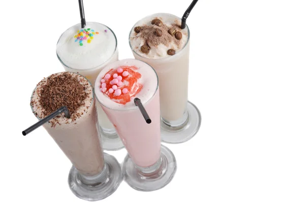 Quattro tipi di bevande al milkshake — Foto Stock