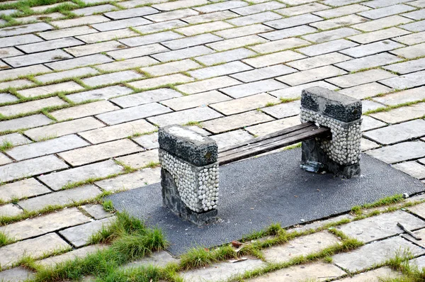 empty concrete bench