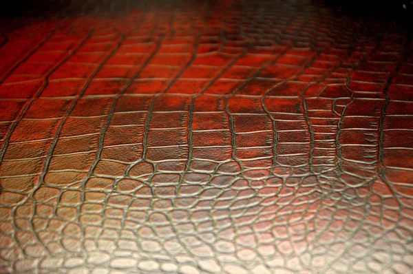 Red dark leather seat upholstery — Stock Photo, Image