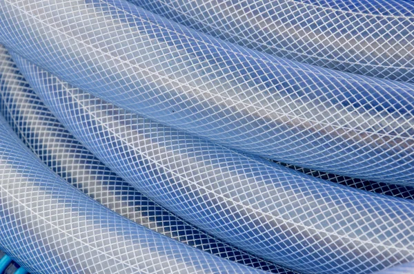 Blue plastic hose background — Stock Photo, Image