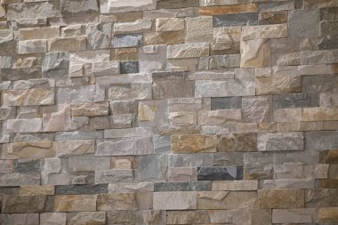 Güzel taş duvar dokusu. Arkaplan, iç mekan ya da tasarımınıza doğal bir dokunuş eklemek için mükemmel..