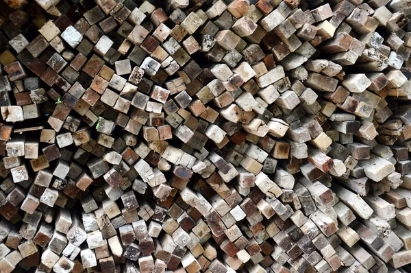 Pattern on stacks of old logs background — Stock Photo, Image