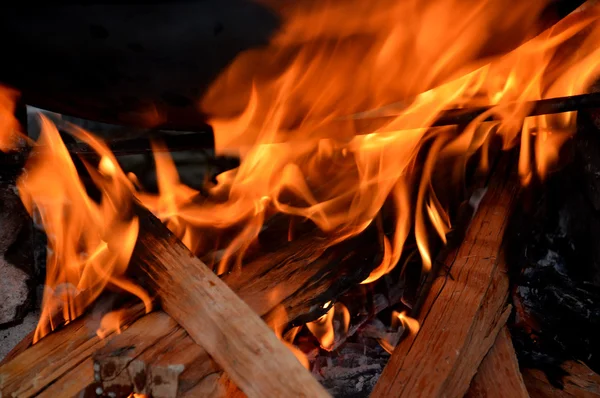 Firewood in the fireplace hearth cooking — Stock Photo, Image