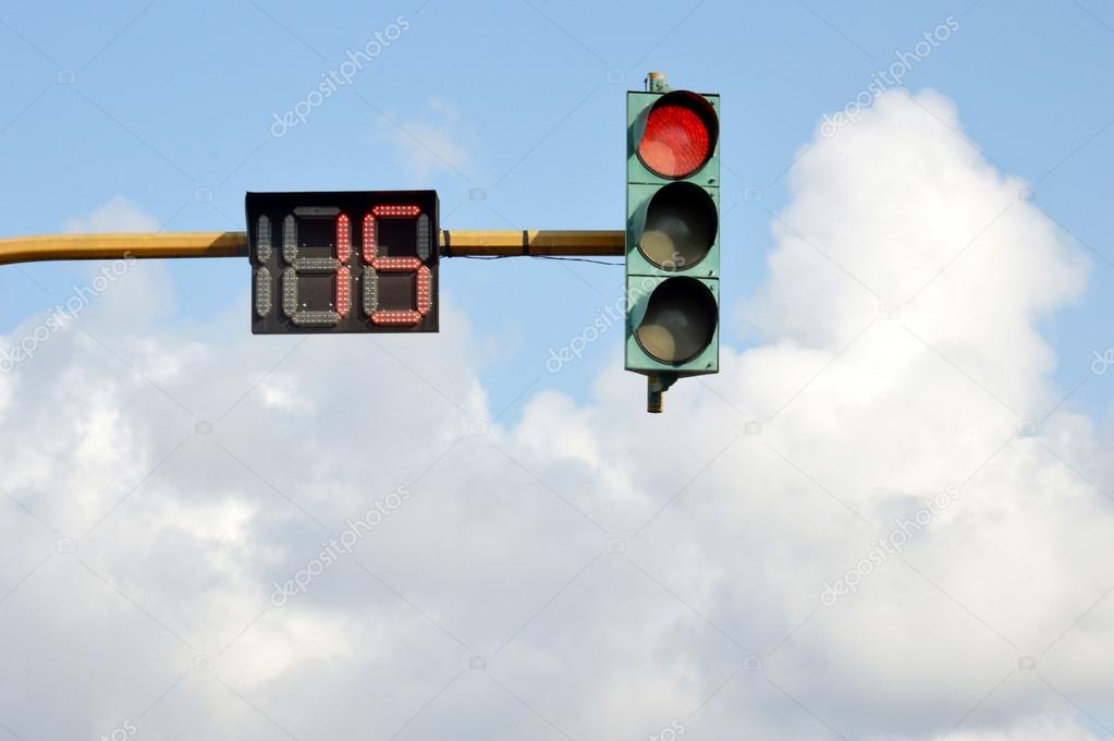 traffic lights against blue sky