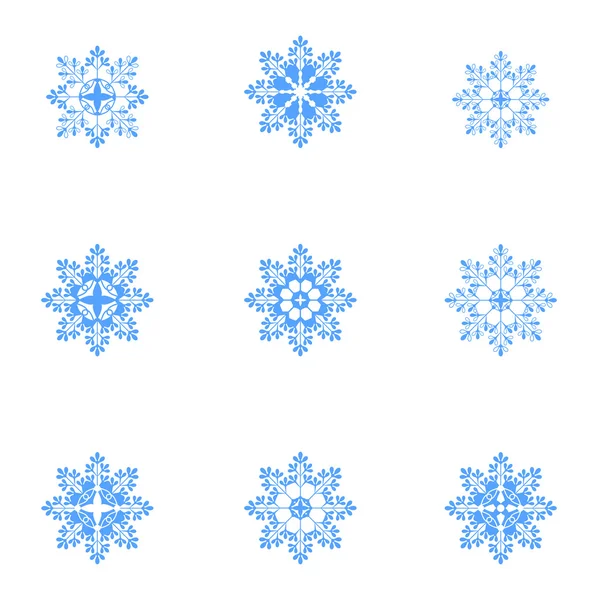 Iconos de copo de nieve — Vector de stock