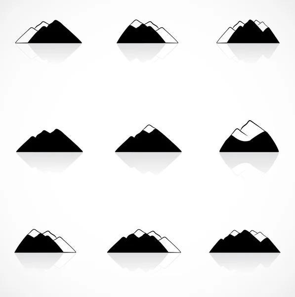 Iconos de montañas negras Vector De Stock