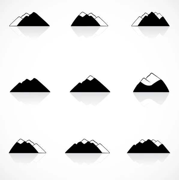 Iconos de montañas negras Vector de stock