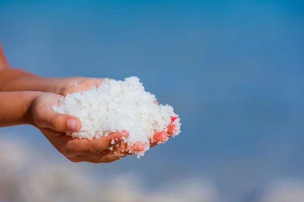 Hands with salt Dead Sea — Stock Photo, Image