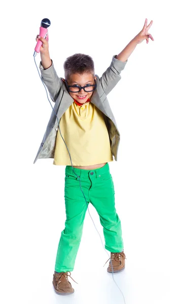 Boy singing with a microphone — Stock Photo, Image