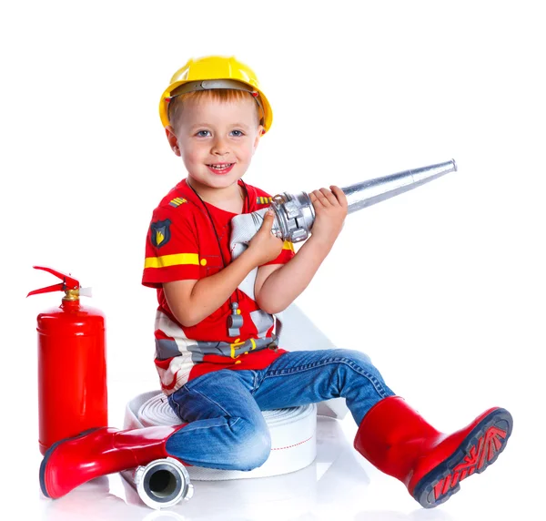 Carino bambino pompiere — Foto Stock