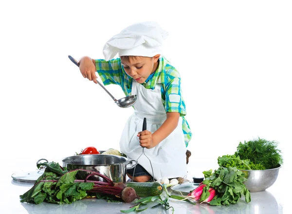 Boy kitchener in chefs hat — Stock Photo, Image