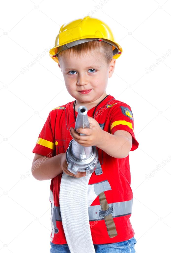 Niño disfraz bombero fotos de stock, imágenes de Niño disfraz bombero sin  royalties