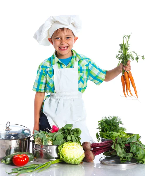 Boy kitchener in chefs hat — Stock Photo, Image