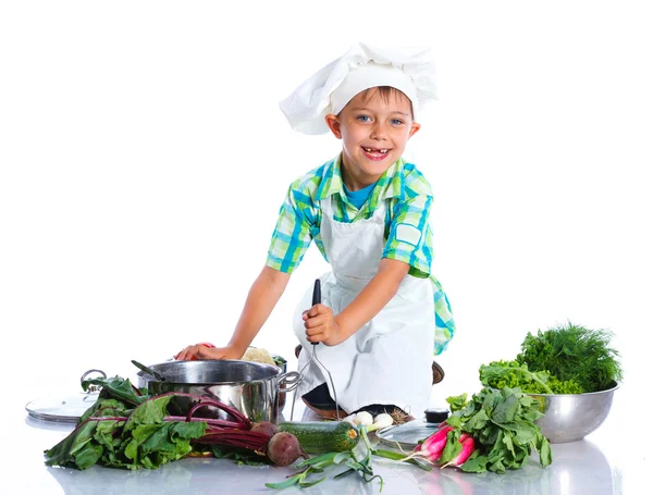 Boy kitchener in chefs hat — Stock Photo, Image