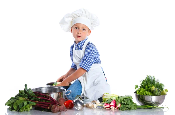 Ragazzo cucina in cuochi cappello — Foto Stock