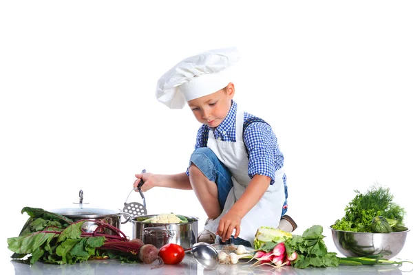 Boy kitchener in chefs hat — Stock Photo, Image