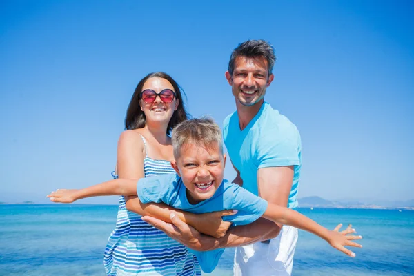 Family Having Fun on Beach Stock Photo