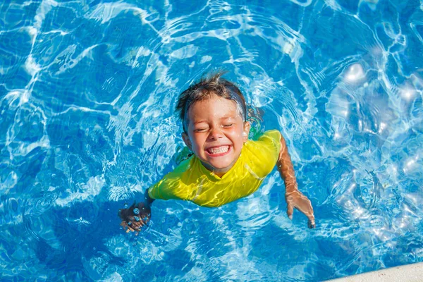 Boy in the pool — Stock Photo, Image