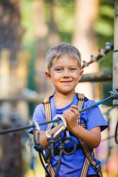 Boy in a climbing adventure park — Stock Photo, Image