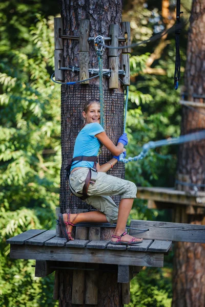 Girl in a climbing adventure park — Stock Photo, Image