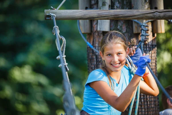 Girl in a climbing adventure park — Stock Photo, Image