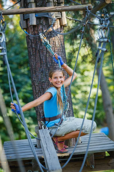 Girl in a climbing adventure park — Stock Photo, Image