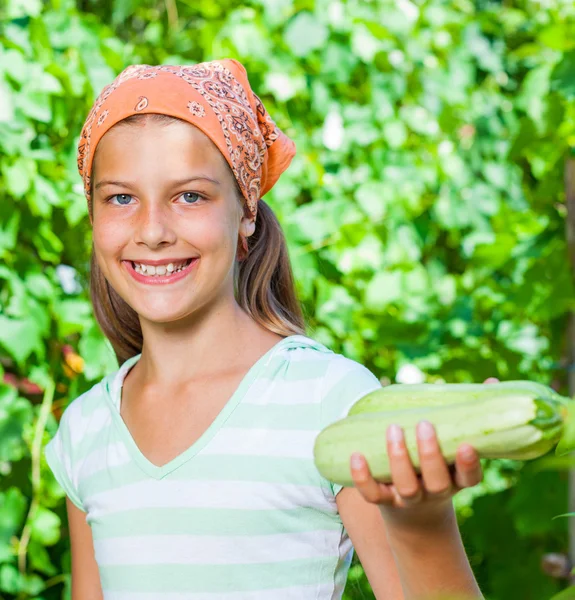 Girl with cabbages — Stock Photo, Image