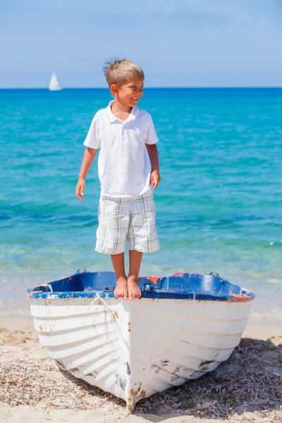 Boy with boat — Stock Photo, Image