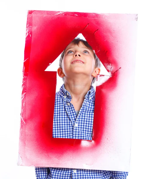 Sevimli çocuk holding kırmızı ok — Stok fotoğraf