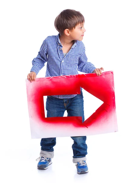 Bonito menino segurando seta vermelha — Fotografia de Stock