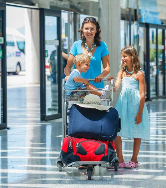 Family in the airport — Stock Photo, Image