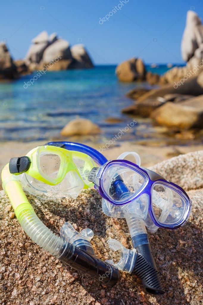 Diving goggles on sea beach — Stock Photo © mac_sim 73155811