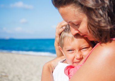 Mother and her son at beach