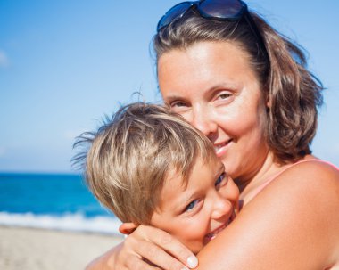 Mother and her son at beach